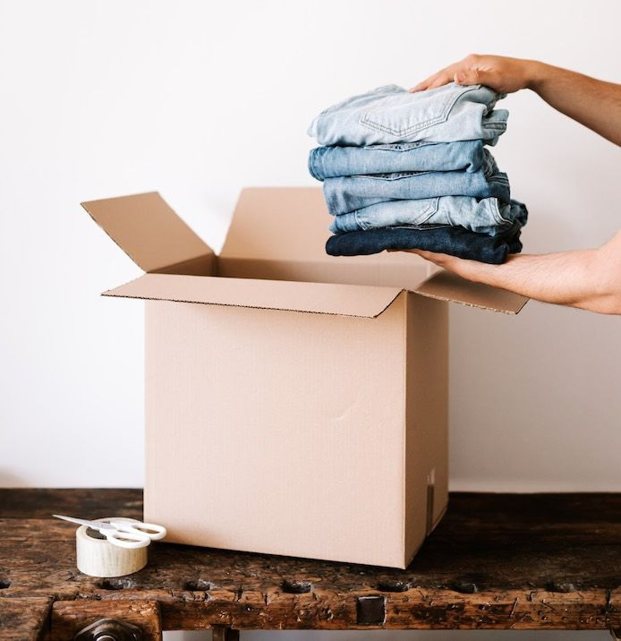 packing clothes in the box